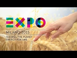 Expo Milano 2015: tema "Nutrire il pianeta, energia per la vita" con simboli di sostenibilità e innovazione alimentare.